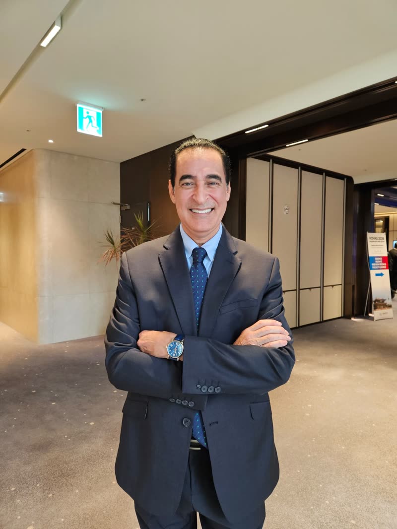 Dr. Nassef at a conference venue